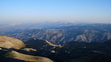 Photo for Panoramic view of Nemrut Mount and Taurus Mountains. Sunrise above Nemrut National park. UNESCO World Heritage Site. Adiyaman province, Turkey - Royalty Free Image