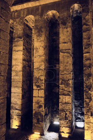 Columns, niches and vaulted ceilings of underground water cistern. Ancient cistern in Dara, settlement of Upper Mesopotamia, province of Mardin, Turkiye