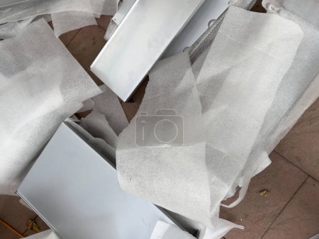 Photo for Paris, France - Nov 11, 2022: Vitsoe shelves on protection plastic wraps during relocation - Royalty Free Image