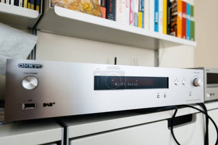 Photo for Paris, France - Dec 13, 2022: Wi-Fi setup on new Onkyo NS-6170 network audio player with DSD Hi-Res Audio and DSD DAB WIFI device on the Vistose 606 sehlves - Royalty Free Image