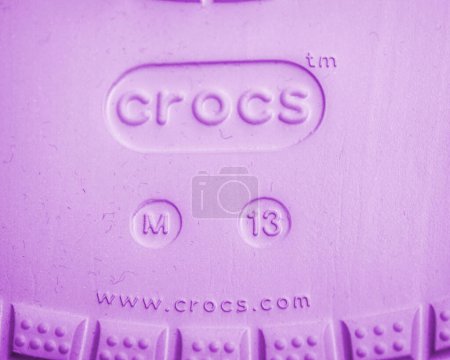 Photo for Paris, France - Dec 2, 2022: Logotype of new Crocs sandals foam clogs M13 size with www.crocs.com internet address - Royalty Free Image