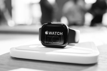 Photo for Paris, France - Oct 28, 2022: Stand with Apple Watch Series 8 LTE with customers defocused in background - Royalty Free Image