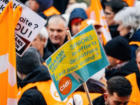 Photo for Strasbourg, France - 31 January 2023: CFDT banners at second demonstration against the new pension reform to be presented next month by French Prime Minister Elisabeth Borne - Royalty Free Image