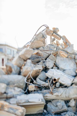 Foto de Construction debris waste multiple stones, wires, metal parts of a former building house office construction - tilt-shift lens - Imagen libre de derechos