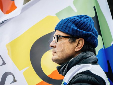 Foto de Strasbourg, France - 31 January 2023: Portrait of a French man with CD eyewear at second demonstration against the new pension reform to be presented next month by French Prime Minister Elisabeth - Imagen libre de derechos