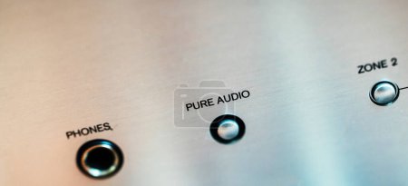 Téléchargez les photos : Pure audio button on a high-end stereo audio hi-fi receiver - close-up tilt-shift lens used - en image libre de droit