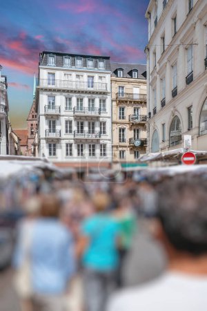 Photo for Defocused crowd of Hundreds of people walking on the street of Strasbourg during the Grande Braderie - street fair and street market annual sale event sell of clothes eyewear - Royalty Free Image