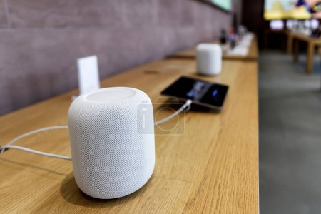 Photo for Paris, France - Mar 20, 2023: Rows of new HomePod 2nd generation with breakthrough sound and intelligence in a row inside Apple Store - Delivering incredible audio quality, enhanced Siri capabilities - Royalty Free Image