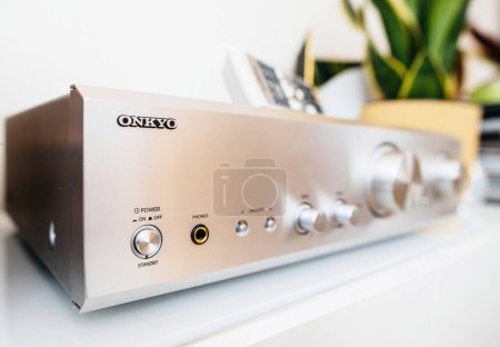 Photo for Paris, France - Feb 6, 2023: A classic Onkyo logo stands out on the face of a vintage integrated amplifier, evoking nostalgia and quality audio. - Royalty Free Image