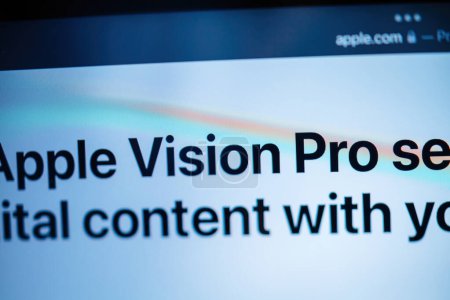 Photo for Paris, France - Jun 6, 2023: Tilt-shift lens over the words vision Pro Creative room table with webpage of Apple on iPad Pro showcasing Apple Vision Pro mixed reality XR headset. Priced 3,499 USD - - Royalty Free Image