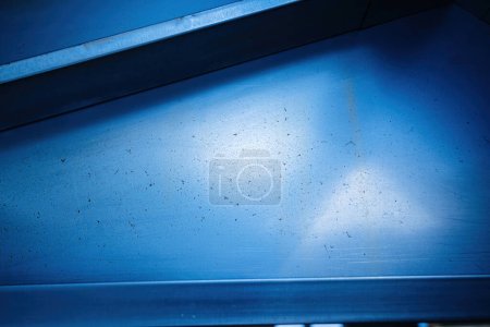 Photo for Grungy kitchen interior with a dirty, greasy wall. Perfect for highlighting the need for renovation or deep cleaning. - Royalty Free Image