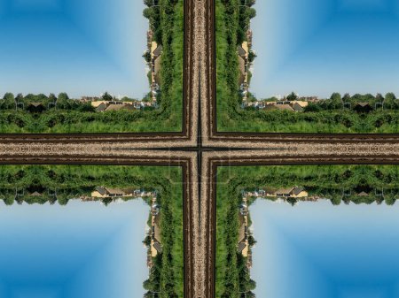 Téléchargez les photos : Image numérique abstraite des routes et des maisons au ciel bleu - banlieue londonienne du train en mouvement - maisons, champs, gratte-ciel - en image libre de droit