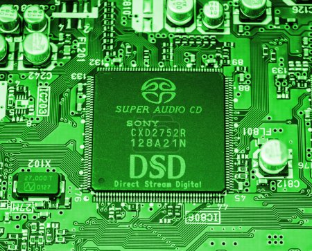 Photo for Tokyo, Japan - Mar 29, 2023: The circuit board houses the notable Sony CXD2752R chip, engineered specifically for SACD Super Audio CD Compact Disk audio interpretation - Royalty Free Image