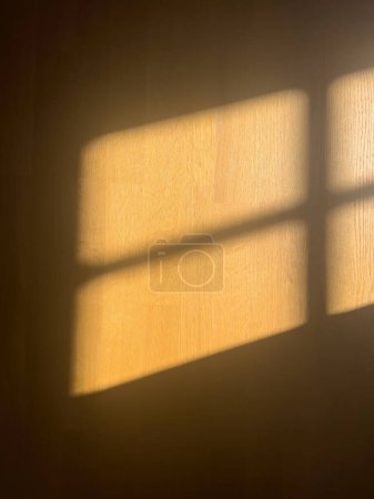 Photo for A beautiful solar light on the wooden parquet floor in the room - Royalty Free Image