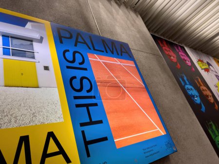 Photo for Mallorca, Spain - Jun 22, 2023: From a low-angle vantage point, a promotional banner for the city of Palma is prominently featured at PMI Airport. - Royalty Free Image