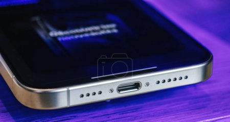Photo for Paris, France - Sep 22, 2023: Close-up view of the USB-C port on the latest iPhone 15 and 15 Pro models, showcasing the ultra-fast charging and data capabilities on the titanium device - Royalty Free Image