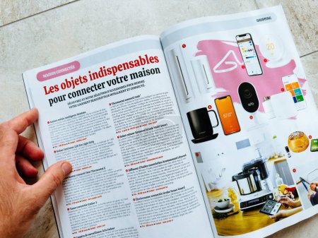 Photo for Paris, France - Oct 11, 2023: The Must-Have Connected Devices for Your Home - A guide to essential items in a tech magazine - Royalty Free Image