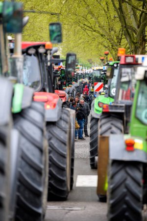 Photo for Strasbourg, France - April 30, 2021: Thousands of tractors parked in the streets of Strasbourg during an agricultural workers protest near the Council of Europe, blocking the street - Royalty Free Image