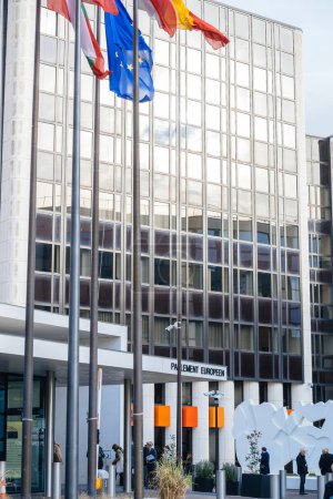 Photo for Strasbourg, France - Nov 22, 2023: The newly renovated entrance to the European Parliament building in Strasbourg, France stands majestically. A few individuals can be seen outdoors, capturing - Royalty Free Image