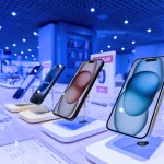 Strasbourg, France - Oct 1, 2023: A hero object view showcasing a row of the latest iPhone 15 Pro smartphones prominently, with the vast interior of the FNAC store forming the backdrop
