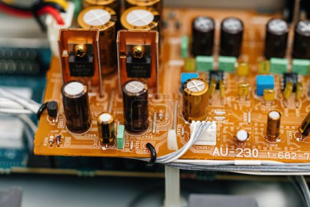 Photo for Tokyo, Japan - Mar 29, 2023: High-end capacitors on a Sony circuit board represent the meticulous engineering behind the brands premium hi-fi audio equipment - Royalty Free Image