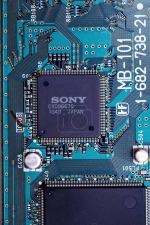 Photo for Tokyo, Japan - Mar 29, 2023: Close-up photography of a Sony CXD9667Q chip on a SACD audio decoding circuit board, showcasing intricate electronic details. - Royalty Free Image