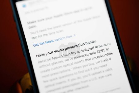 Photo for California, USA - Jan 21, 2024: On the display of the new iPhone 15 Pro, a message reminds users to have their vision prescription handy for proper use of the new Apple Vision Pro mixed reality - Royalty Free Image