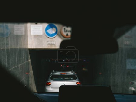 Photo for Mallorca, Spain - Jun 27, 2023: A front view captured from inside a Dacia car as it enters a garage in Palma de Mallorca, offering a perspective of the seamless parking experience - Royalty Free Image