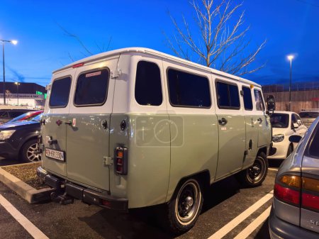 Photo for Frankfurt, Germany - Dec 29, 2023: A VAZ russian van parked in a parking lot surrounded by other cars. - Royalty Free Image
