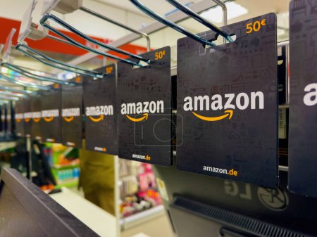Photo for Frankfurt, Germany - Jan 13, 2024: Rows of Amazon Prime gift cards, each valued at 50 euros, are neatly displayed and ready for purchase at a showcase event, offering convenience and choice to - Royalty Free Image