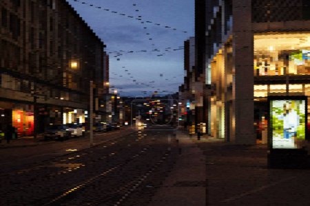 Téléchargez les photos : Ville futuriste dans le monde de l'internet - Une rue animée prend vie la nuit, alors que les lumières illuminent la route et les bâtiments, projetant une lueur envoûtante sur les environs. - en image libre de droit