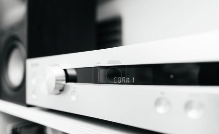 Photo for COAX 1 signage on the luxury preamplifier in an audiophile room, black and white image to illustrate an article about new music releases, emphasizing high-end audio equipment in a dedicated listening - Royalty Free Image