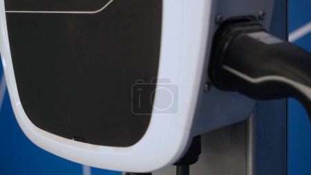 Photo for EV Charger quick charge type at car parking which DC Charging faster than AC system. EV Charger car station charging use AC socket plug for electric engine vehicle. Future transport energy technology - Royalty Free Image