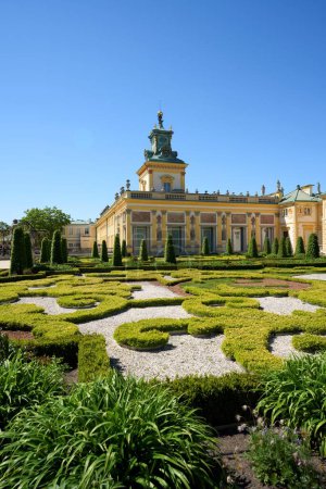 Photo for Old palace at garden in Wilanow in european Warsaw city of Poland in Masovian region, clear blue sky in 2022 warm sunny spring day on May - vertical - Royalty Free Image