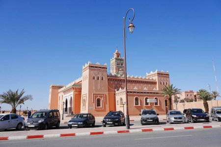 Photo for Architecture of mosque in african Zagora town in Draa Tafilalet region in Morocco, clear blue sky in 2023 warm sunny winter day on January. - Royalty Free Image