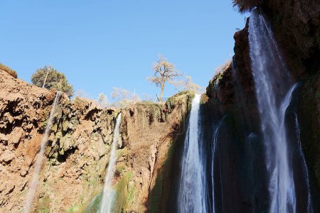 Photo for Ouzoud waterfalls at Azilal province in Morocco, clear blue sky in 2023 warm sunny winter day on January. - Royalty Free Image