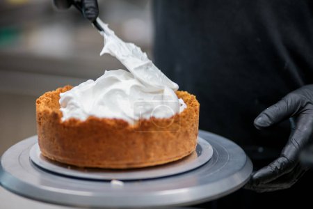 Photo for Catering chef preparing key lime pie in pro kitchen - Royalty Free Image