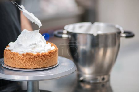 Photo for Catering chef preparing key lime pie in pro kitchen - Royalty Free Image