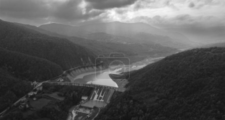 Photo for Mignano Dam, Piacenza Italy - November 2022 aerial Panorama of dry articifial lake dam and surrounding in autumn - Royalty Free Image