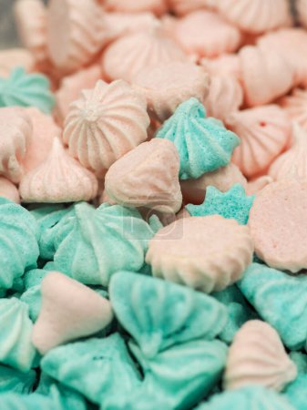 Photo for Bunch of pink and light blue meringues for cake and sweets decoration footage - Royalty Free Image
