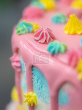 Photo for Pastry chef designer making a football soccer ball as a frosted cake topper photo - Royalty Free Image