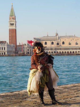 Photo for Venice, Italy - 13th february 2023 Carnival time and masked people gather in costume in Piazza San Marco area, Venezia. - Royalty Free Image