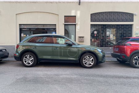 Photo for Cremona, Italy - May 2023 District Green Audi Q5 parked in the street. - Royalty Free Image