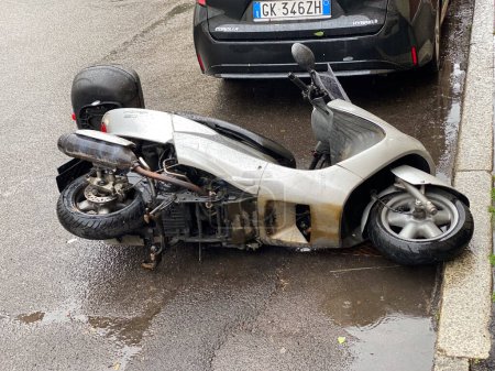 Photo for Cremona, Italy - May 2023 Scooter fallen in the street. Traffic Accident. - Royalty Free Image