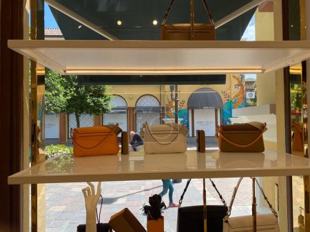 Photo for Fidenza, Italy - May 2023 Furla leather goods store in luxury fashion shopping mall in Fidenza Vilage, Italy - Royalty Free Image