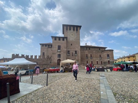 Photo for Fontanellato, Italy - May 2023 Antique market in the center of the city surrounding San Vitali medieval castle in Parma province, Italy. - Royalty Free Image