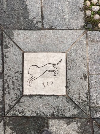 Photo for Roccabianca, Parma , Italy - december 31st 2023 astrological esoteric sign tiles on the floor in downtown Roccabianca in Duchy of Parma, Italy - Royalty Free Image