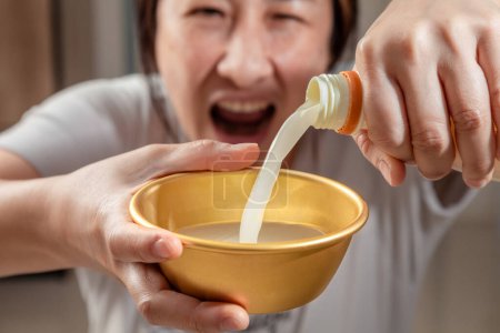 Photo for Asian women enjoying drinking makgeolli to celebrate. Makgeolli rice wine is a Korean fermented alcoholic beverage traditional drinks. - Royalty Free Image