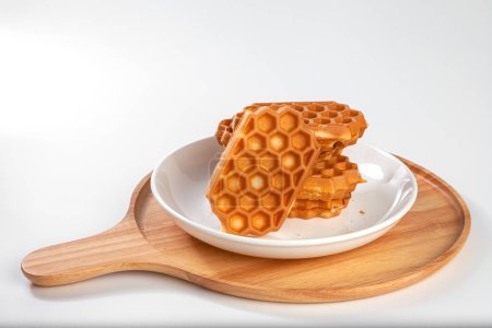 Photo for Waffles on a white table. Fresh waffles breakfast, snack on white background - Royalty Free Image
