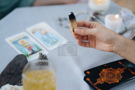 Photo for A woman is making tarot layout on the table. High quality photo - Royalty Free Image